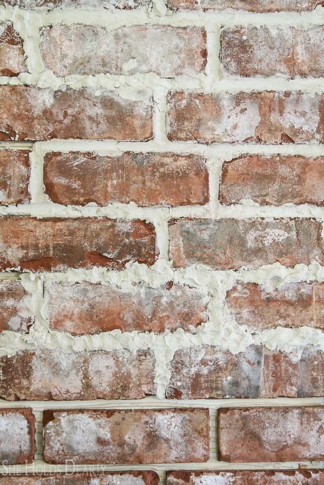 How to Install a Rustic Brick Accent Wall by She Holds Dearly