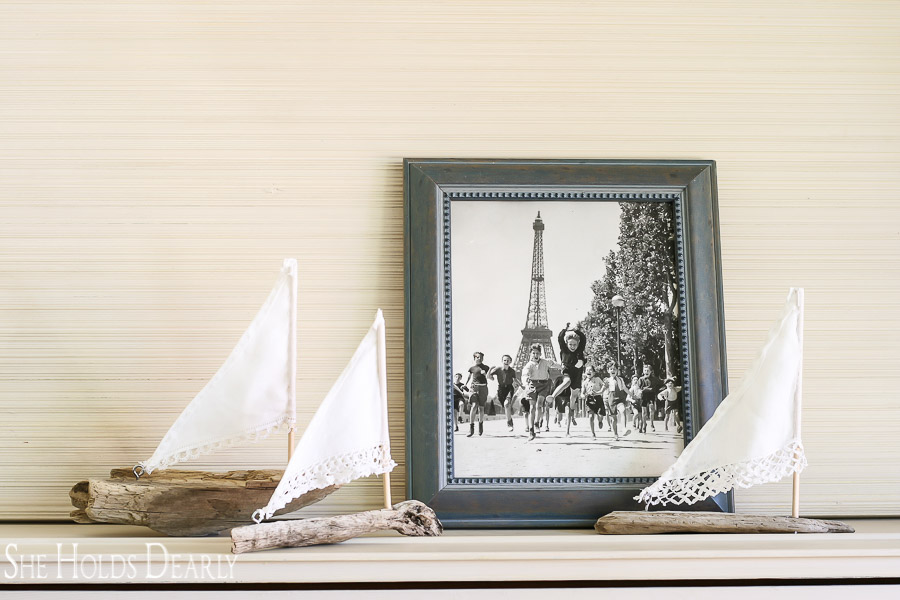 Here is a darling way to use a vintage handkerchief and a piece of driftwood, make your own driftwood sailboat! A perfect gift or centerpiece.