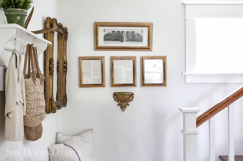hanging mirror on plaster wall